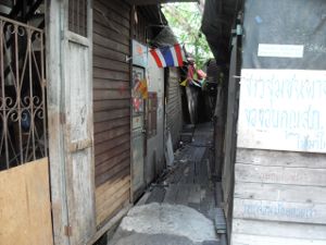 Makeshift houses built along the canal - Bangkok